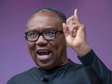 Peter Obi with raised hand making a point